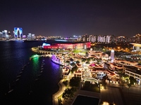 A photo is showing the night view of Moonlight Pier, a business district in Suzhou, Jiangsu province, China, on May 29, 2024. (