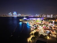 A photo is showing the night view of Moonlight Pier, a business district in Suzhou, Jiangsu province, China, on May 29, 2024. (