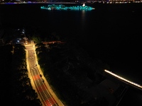 A photo is showing the night view of Moonlight Pier, a business district in Suzhou, Jiangsu province, China, on May 29, 2024. (