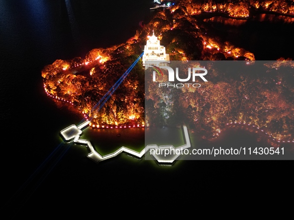 A photo is showing the night view of Moonlight Pier, a business district in Suzhou, Jiangsu province, China, on May 29, 2024. 