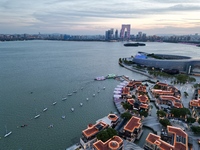 A photo is showing the night view of Moonlight Pier, a business district in Suzhou, Jiangsu province, China, on May 29, 2024. (