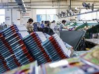 A worker is producing pencils at a production workshop in Suqian, Jiangsu province, China, on July 24, 2024. (