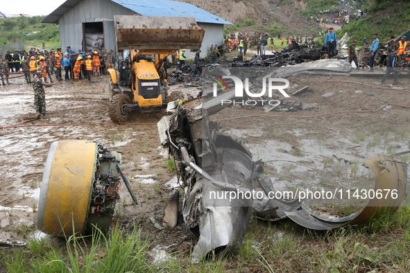 A Saurya Airlines aircraft is crashing at Tribhuvan International Airport in Kathmandu, Nepal, on July 24, 2024. 