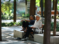 Senior citizens are relaxing at a park in Fuyang, China, on July 22, 2024. (