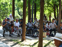 Senior citizens are relaxing at a park in Fuyang, China, on July 22, 2024. (