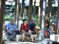 Senior citizens are relaxing at a park in Fuyang, China, on July 22, 2024. (