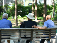 Senior citizens are relaxing at a park in Fuyang, China, on July 22, 2024. (