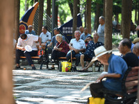 Senior citizens are relaxing at a park in Fuyang, China, on July 22, 2024. (