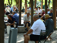 Senior citizens are relaxing at a park in Fuyang, China, on July 22, 2024. (