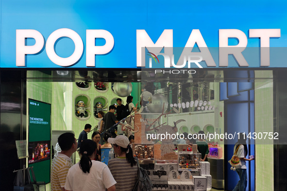 Customers are being seen at the POPMART flagship store in Shanghai, China, on July 24, 2024. 