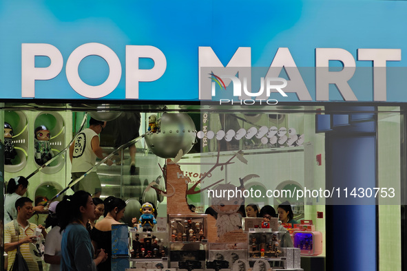 Customers are being seen at the POPMART flagship store in Shanghai, China, on July 24, 2024. 