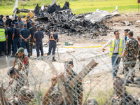 The wreckage of the Saurya Airlines plane is lying at Tribhuvan International Airport (TIA) in Kathmandu, Nepal, on Wednesday morning. Out o...