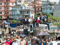 Spectators are gathering around to see the wreckage of the Saurya Airlines plane that crashed at Tribhuvan International Airport (TIA) in Ka...