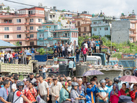 Spectators are gathering around to see the wreckage of the Saurya Airlines plane that crashed at Tribhuvan International Airport (TIA) in Ka...