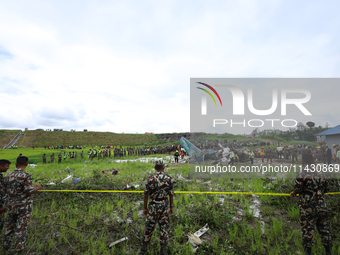 The Nepal Army is cordoning off the crash site of Saurya Airlines, a domestic flight carrier that crashed in Tribhuvan International Airport...