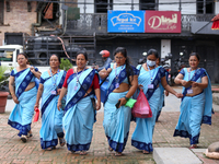 Nepali health workers are heading towards a school to administer polio drops to children under the age of 5 following the government's speci...