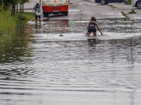 A street is flooding after a strong storm and downpour in Gdansk, Poland, on July 24, 2024. Heavy downpours and strong storms are causing nu...