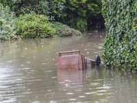 A street is flooding after a strong storm and downpour in Gdansk, Poland, on July 24, 2024. Heavy downpours and strong storms are causing nu...