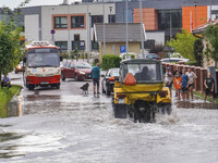 A street is flooding after a strong storm and downpour in Gdansk, Poland, on July 24, 2024. Heavy downpours and strong storms are causing nu...