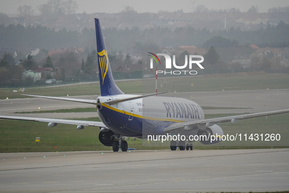 A Ryanair plane is taxiing on the airport tarmac at Lech Walesa Airport (EPGD) in Gdansk, Poland, on April 1, 2024. 