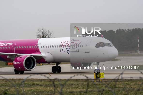 A Wizz Air plane is taxiing on the airport tarmac at Lech Walesa Airport (EPGD) in Gdansk, Poland, on April 1, 2024. 