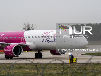 A Wizz Air plane is taxiing on the airport tarmac at Lech Walesa Airport (EPGD) in Gdansk, Poland, on April 1, 2024. (