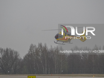 An air ambulance (LPR) Eurocopter helicopter is being seen at Lech Walesa Airport (EPGD) in Gdansk, Poland, on April 1, 2024. (