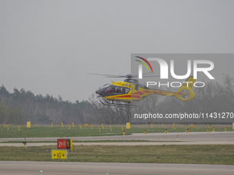 An air ambulance (LPR) Eurocopter helicopter is being seen at Lech Walesa Airport (EPGD) in Gdansk, Poland, on April 1, 2024. (