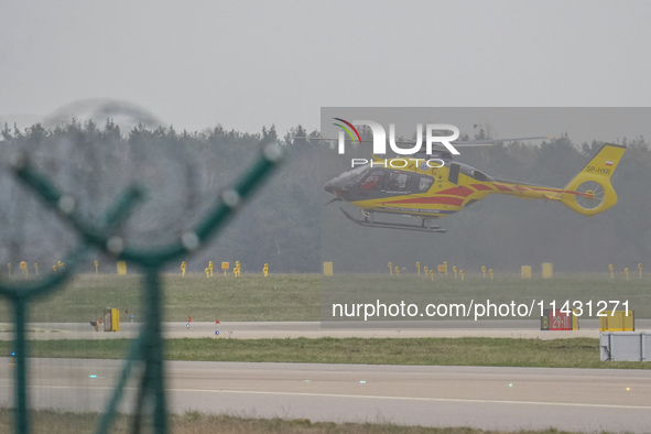 An air ambulance (LPR) Eurocopter helicopter is being seen at Lech Walesa Airport (EPGD) in Gdansk, Poland, on April 1, 2024. 