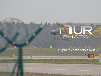 An air ambulance (LPR) Eurocopter helicopter is being seen at Lech Walesa Airport (EPGD) in Gdansk, Poland, on April 1, 2024. (