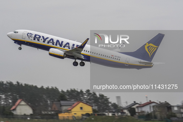 A Ryanair (SP-RST) plane is taking off from the airport tarmac at Lech Walesa Airport (EPGD) in Gdansk, Poland, on April 1, 2024. 