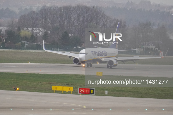 A Ryanair (SP-RST) plane is taking off from the airport tarmac at Lech Walesa Airport (EPGD) in Gdansk, Poland, on April 1, 2024. 