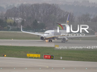 A Ryanair (SP-RST) plane is taking off from the airport tarmac at Lech Walesa Airport (EPGD) in Gdansk, Poland, on April 1, 2024. (