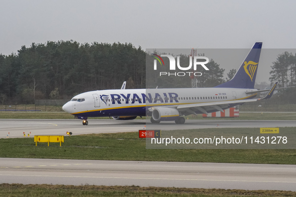 A Ryanair plane is taxiing on the airport tarmac at Lech Walesa Airport (EPGD) in Gdansk, Poland, on April 1, 2024. 