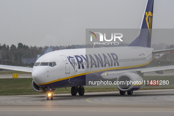 A Ryanair plane is taxiing on the airport tarmac at Lech Walesa Airport (EPGD) in Gdansk, Poland, on April 1, 2024. 