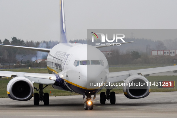 A Ryanair plane is taxiing on the airport tarmac at Lech Walesa Airport (EPGD) in Gdansk, Poland, on April 1, 2024. 