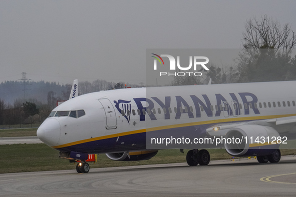 A Ryanair plane is taxiing on the airport tarmac at Lech Walesa Airport (EPGD) in Gdansk, Poland, on April 1, 2024. 