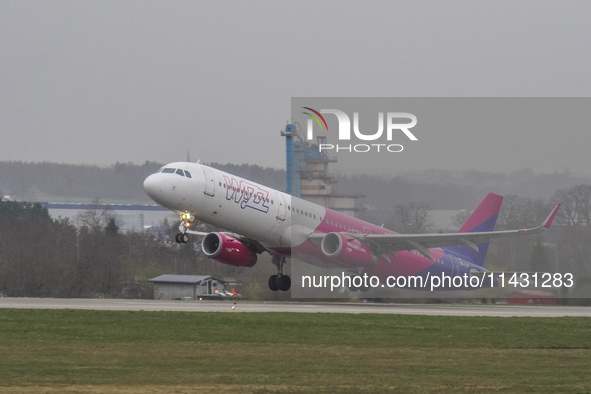 A Wizzair plane is taking off from the airport tarmac at Lech Walesa Airport (EPGD) in Gdansk, Poland, on April 1, 2024. 