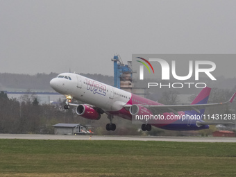 A Wizzair plane is taking off from the airport tarmac at Lech Walesa Airport (EPGD) in Gdansk, Poland, on April 1, 2024. (