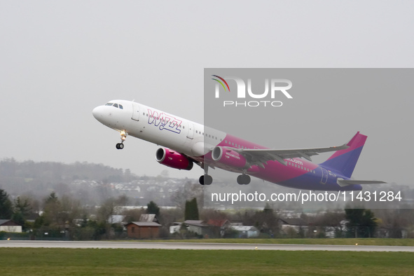 A Wizzair plane is taking off from the airport tarmac at Lech Walesa Airport (EPGD) in Gdansk, Poland, on April 1, 2024. 