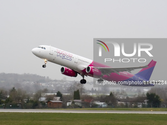 A Wizzair plane is taking off from the airport tarmac at Lech Walesa Airport (EPGD) in Gdansk, Poland, on April 1, 2024. (