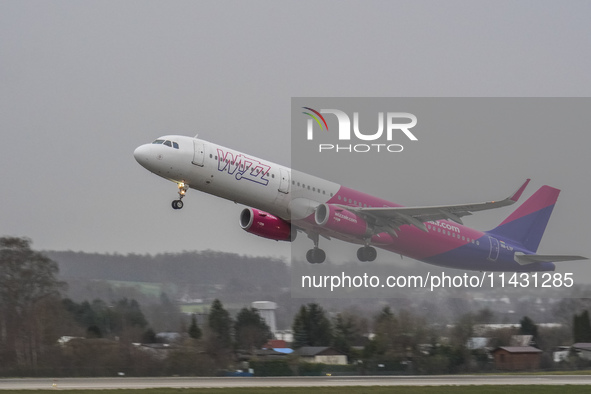 A Wizzair plane is taking off from the airport tarmac at Lech Walesa Airport (EPGD) in Gdansk, Poland, on April 1, 2024. 