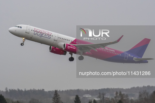 A Wizzair plane is taking off from the airport tarmac at Lech Walesa Airport (EPGD) in Gdansk, Poland, on April 1, 2024. 