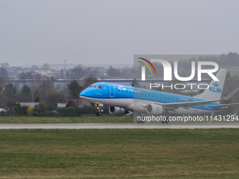 A KLM Cityhopper plane is taking off from the airport tarmac at Lech Walesa Airport (EPGD) in Gdansk, Poland, on April 1, 2024. (