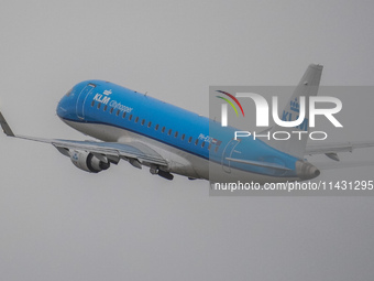 A KLM Cityhopper plane is taking off from the airport tarmac at Lech Walesa Airport (EPGD) in Gdansk, Poland, on April 1, 2024. (