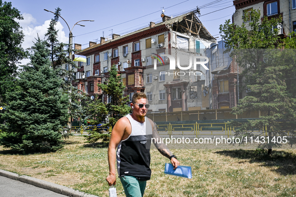 One of the sections of the five-storey apartment building at 44 Sobornyi Avenue that was destroyed by the Russian missile attack on October...