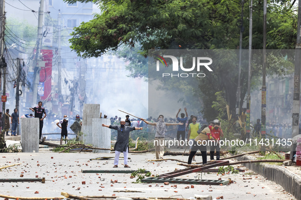 Students are clashing with police during a protest over a controversial quota system for government job applicants in Dhaka, Bangladesh, on...