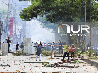 Students are clashing with police during a protest over a controversial quota system for government job applicants in Dhaka, Bangladesh, on...