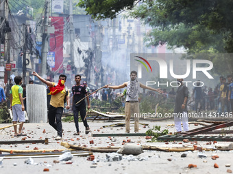 Students are clashing with police during a protest over a controversial quota system for government job applicants in Dhaka, Bangladesh, on...