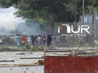 Students are clashing with police during a protest over a controversial quota system for government job applicants in Dhaka, Bangladesh, on...